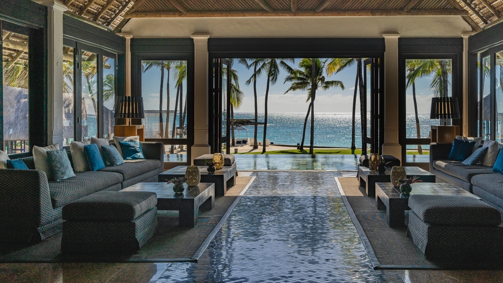 the,lobby,at,the,resort.,upholstered,sofas,with,cushions,,armchairs,